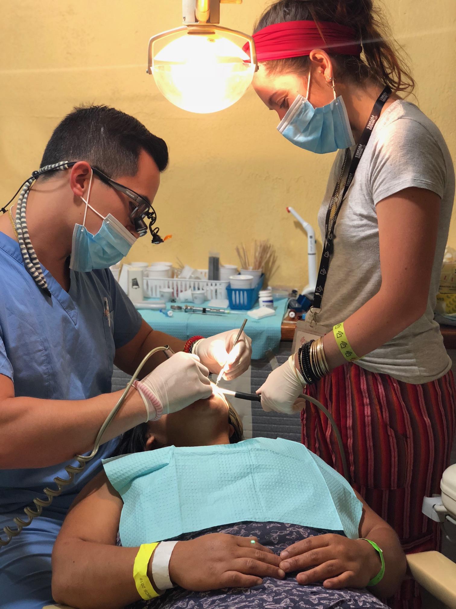 Dr. Brandon Wong DMD performing procedure in Mindo, Ecuador