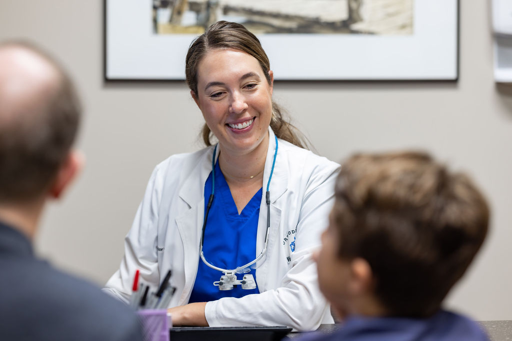 Orthodontist Dr. Taylor Varner with Patient During Orthodontic Consultation